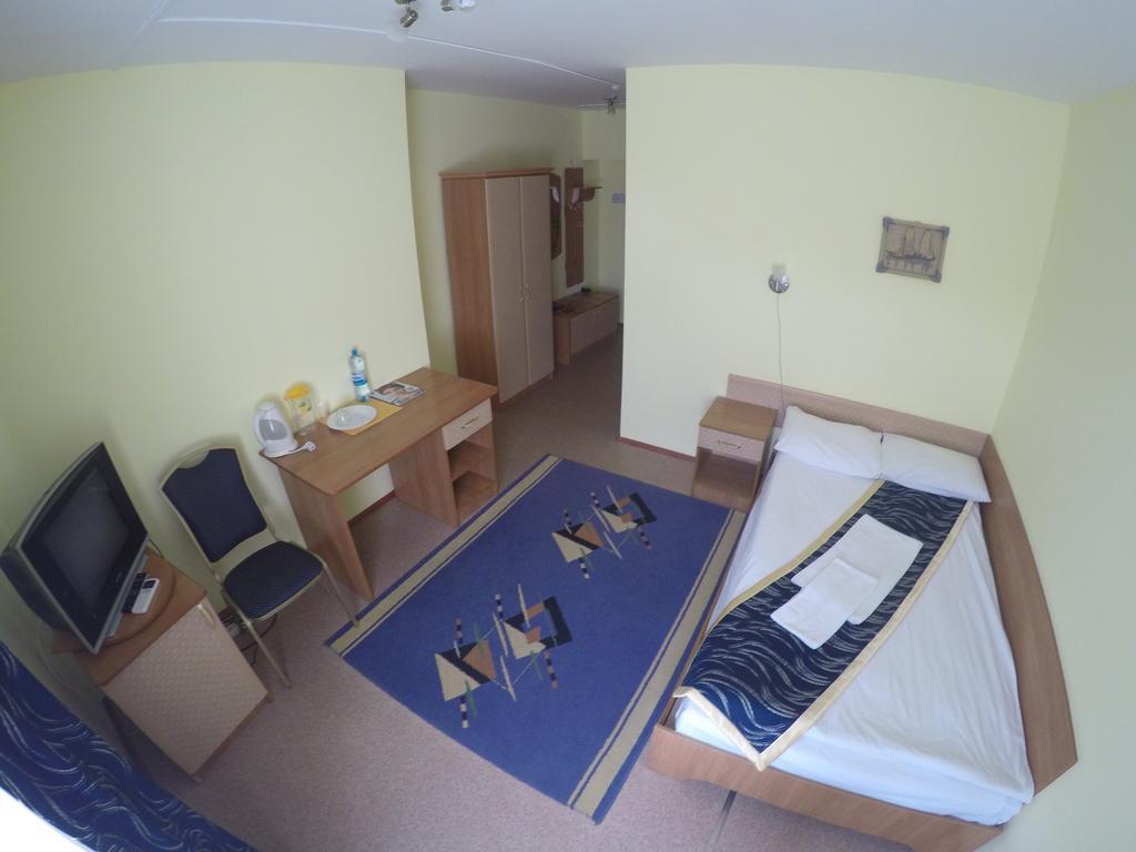 Kurmet Hotel Uralsk Room photo